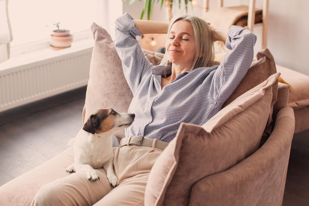 stop panic attacks so you can relax - middle aged woman relaxing at home