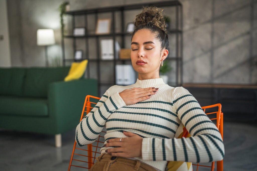 one woman meditate practice meditation at home self care concept stop panic attacks