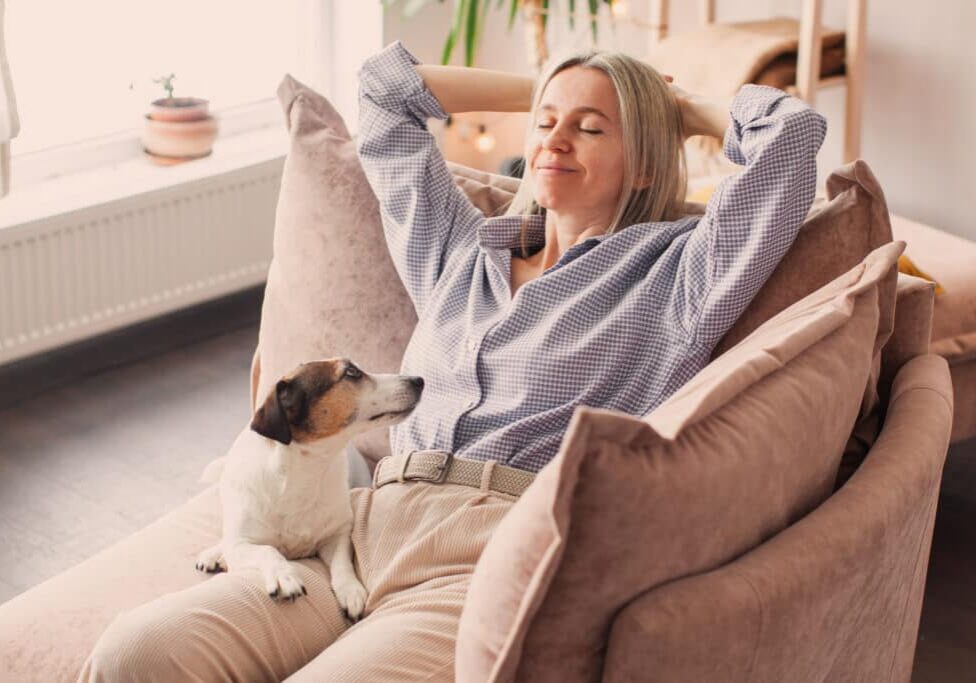 stop panic attacks so you can relax - middle aged woman relaxing at home