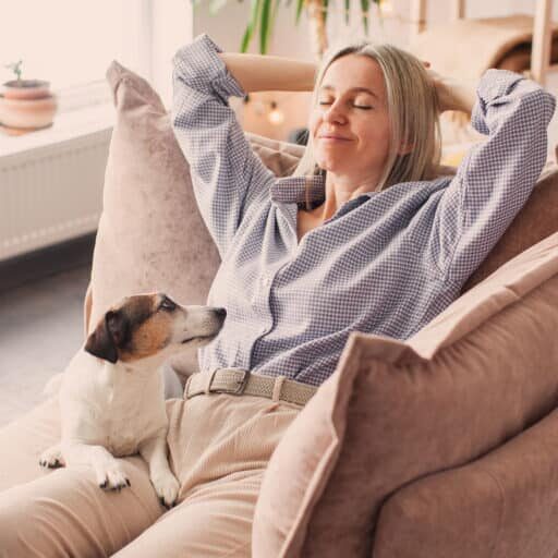 stop panic attacks so you can relax - middle aged woman relaxing at home