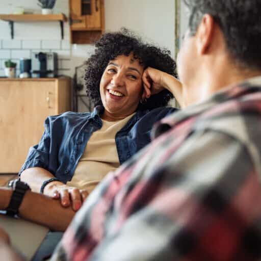 Middle aged couple relaxing at home from everyday stress and anxiety