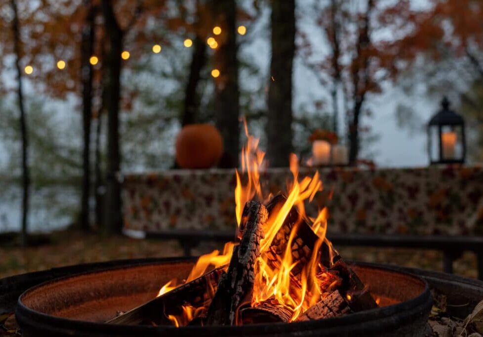 Closeup of glowing outdoor campfire in fall