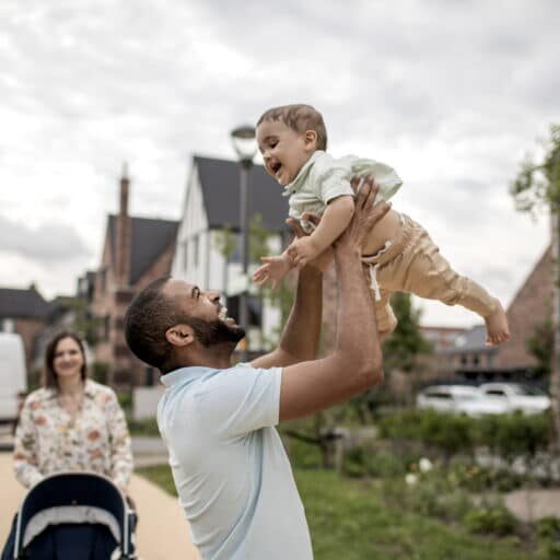 Modern fatherhood outdoor lifestyle in the neighbourhood for diverse family